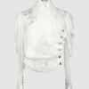 Fitted blouse with a draped front and voluminous sleeves