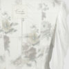 Fitted blouse with a draped front and voluminous sleeves