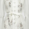 The loose-fitting blouse made of pure silk