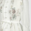 The loose-fitting blouse made of pure silk