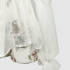 The loose-fitting blouse made of pure silk