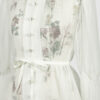 The loose-fitting blouse made of pure silk