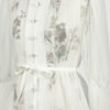 The loose-fitting blouse made of pure silk