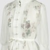 The loose-fitting blouse made of pure silk