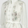 The loose-fitting blouse made of pure silk