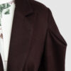 Coat with draped sleeves