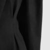 Coat with draped sleeves
