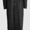 Coat with draped sleeves