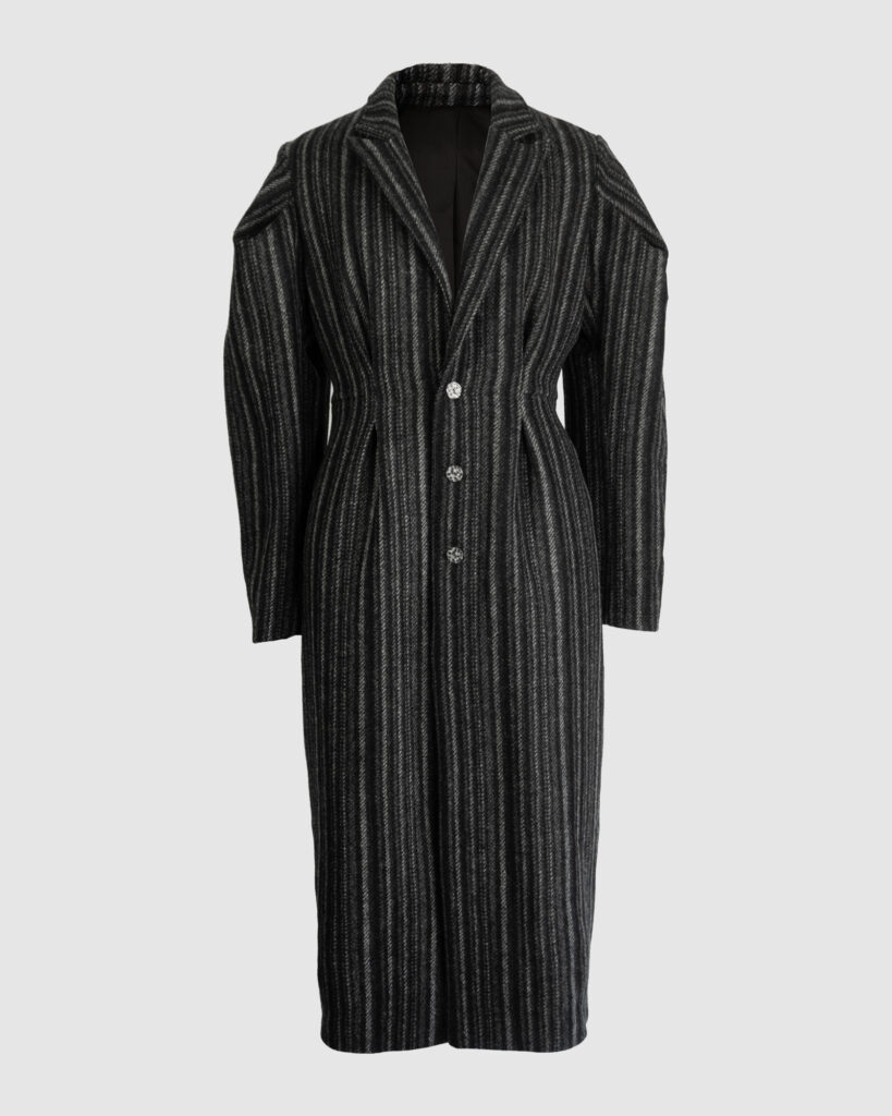 Coat with draped sleeves