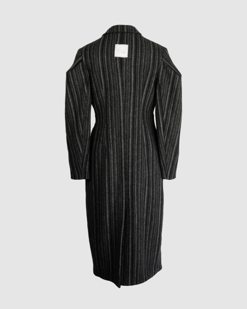 Coat with draped sleeves