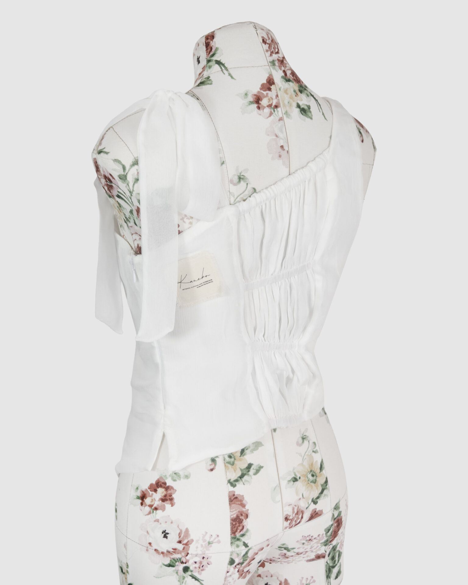 Asymmetric bustier top