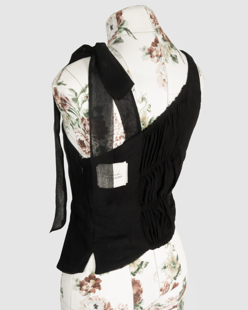 Asymmetric bustier top
