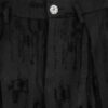 Trousers with overlapping pleats